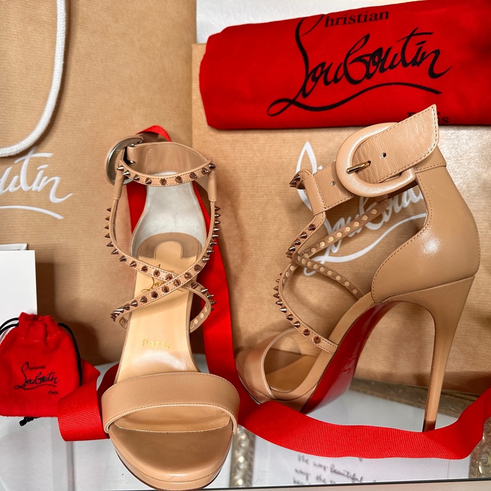 Christian Louboutin heels. Sz 37. Worn once, with Bags and Receipt. Elegance.